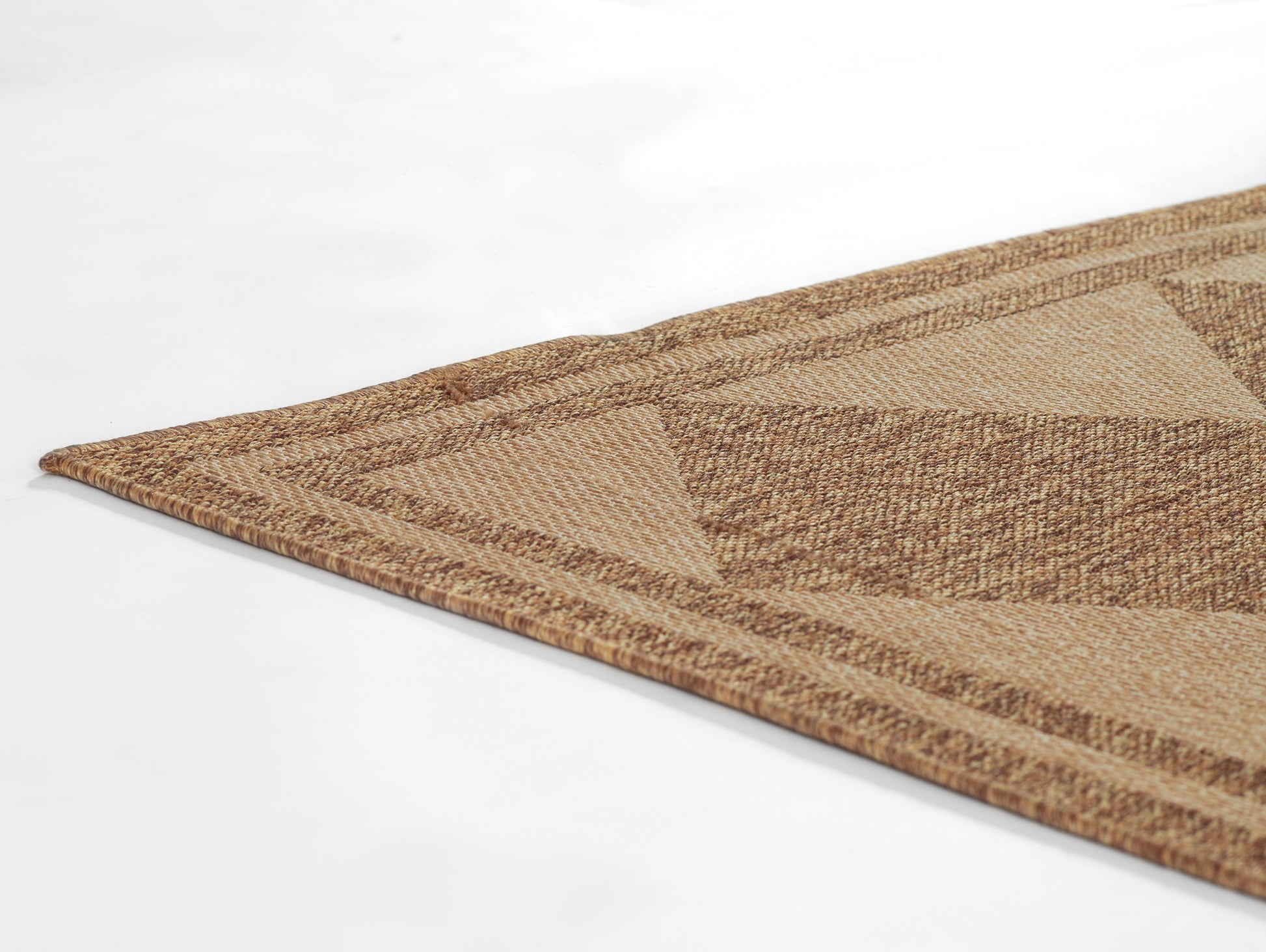 Natural beige jute rug with brown geometric triangles; flat-weave, rectangular floor art.