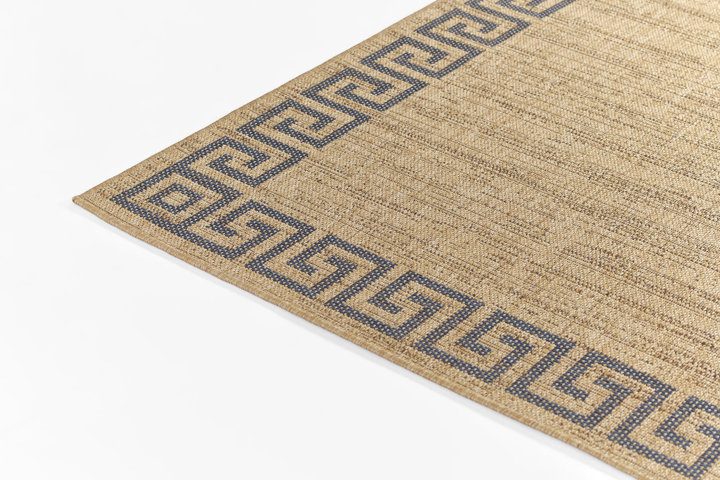 Beige jute rug with blue Greek-key border along the edge; rectangular with natural textured surface.