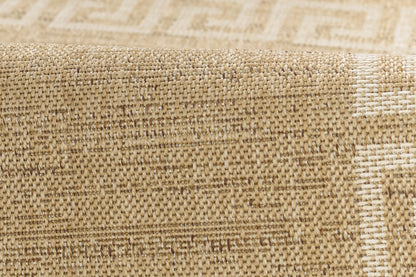 Beige natural fiber woven rug with tight texture and ivory geometric border; rustic boho style.