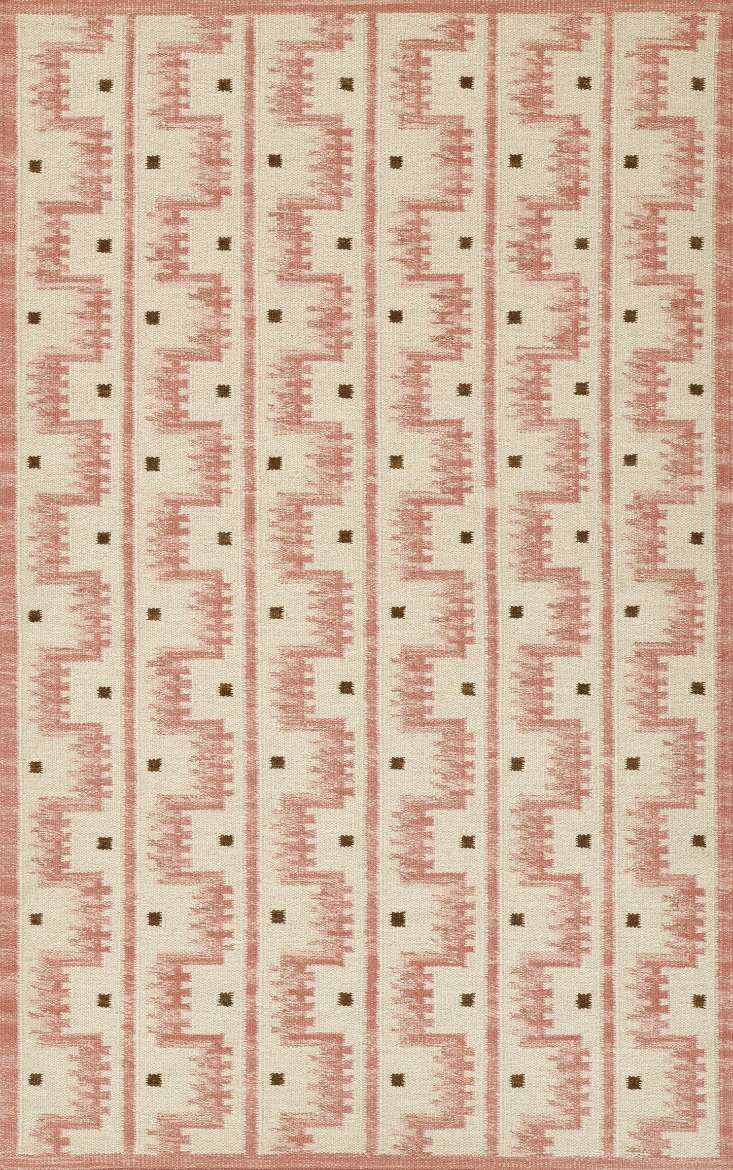 Beige rug with vertical pink Scandinavian geometric motifs and tiny black squares in a repeating pattern.