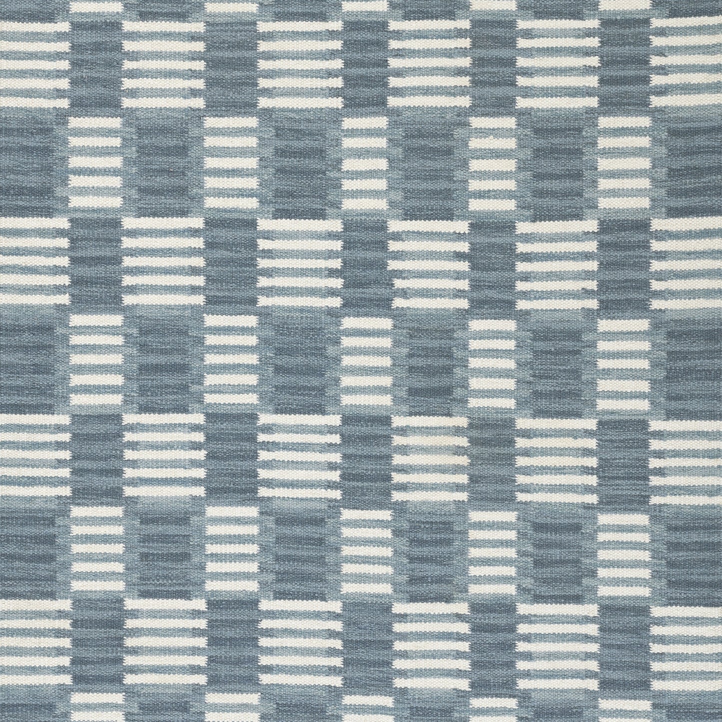 Blue & white Scandinavian-style woven fabric with a geometric checkered grid pattern, ideal for rug or upholstery.