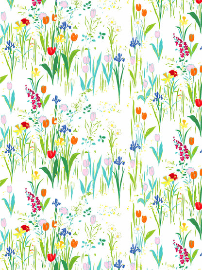 Watercolor floral pattern with green stems and bright pink, orange, yellow, blue and red blooms on white background.
