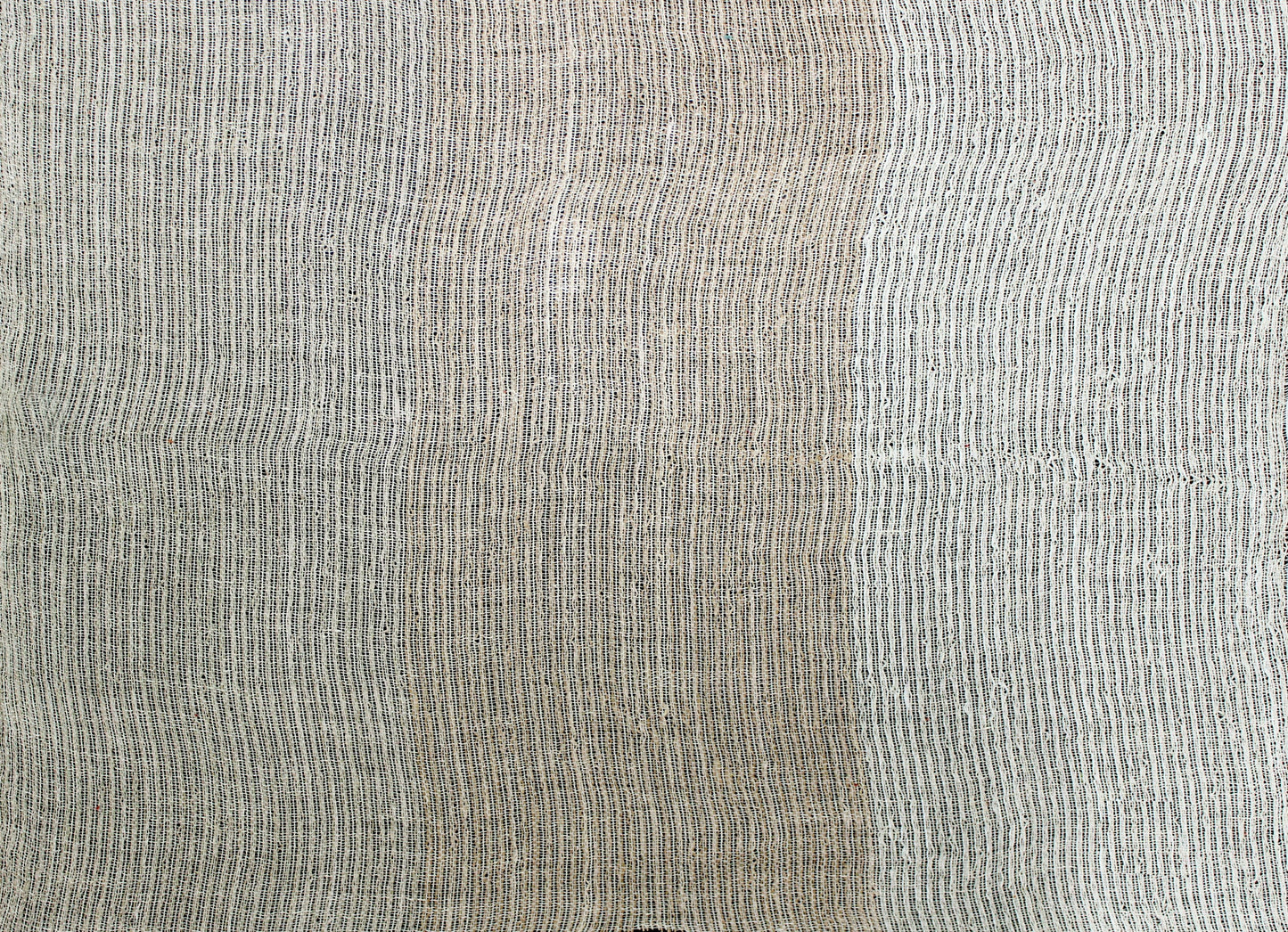 Beige woven fabric swatch with fine vertical dark stripes; linen-like texture.