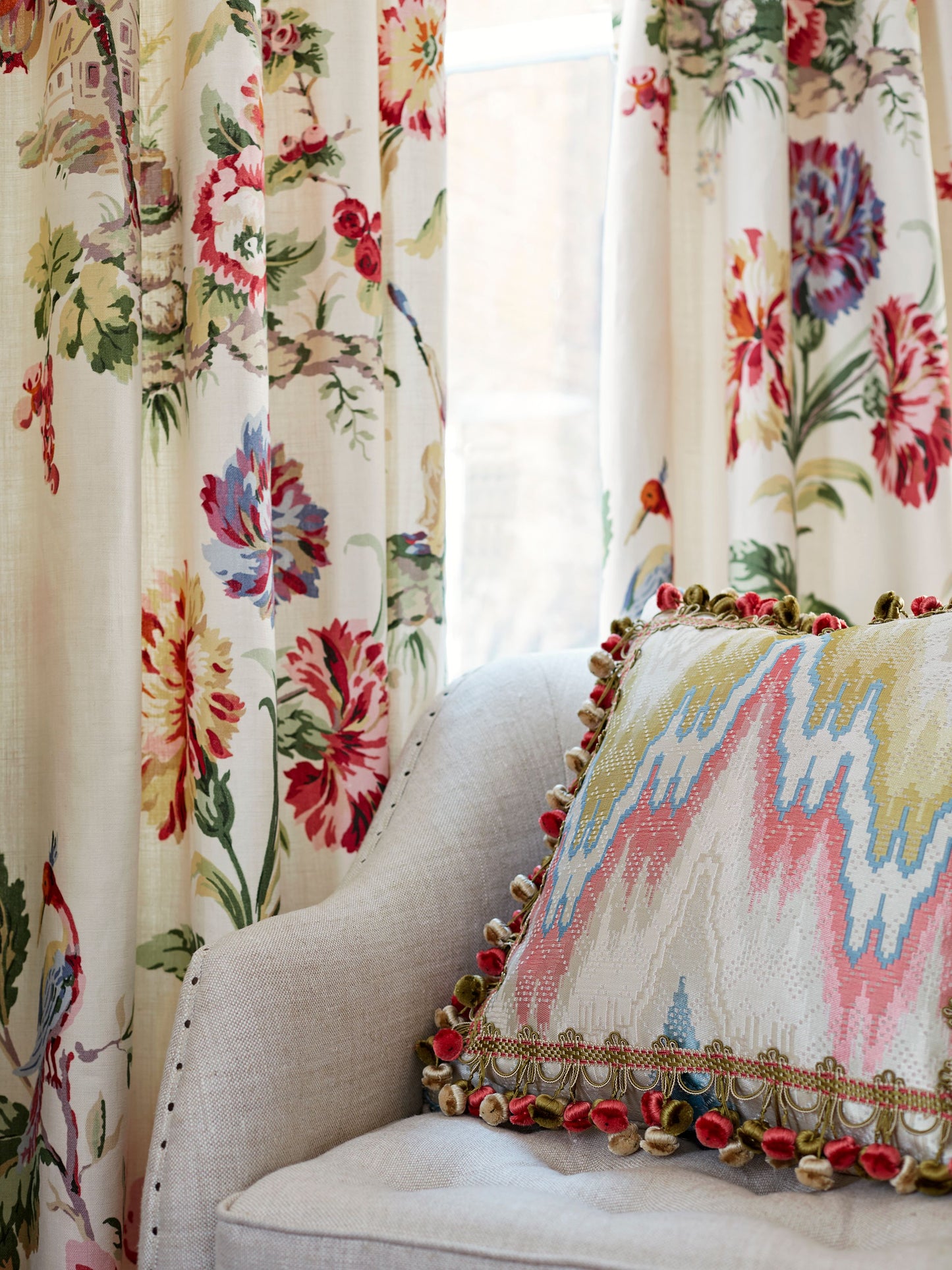 Beige fabric close-up with a geometric zigzag Bargello-style pattern.