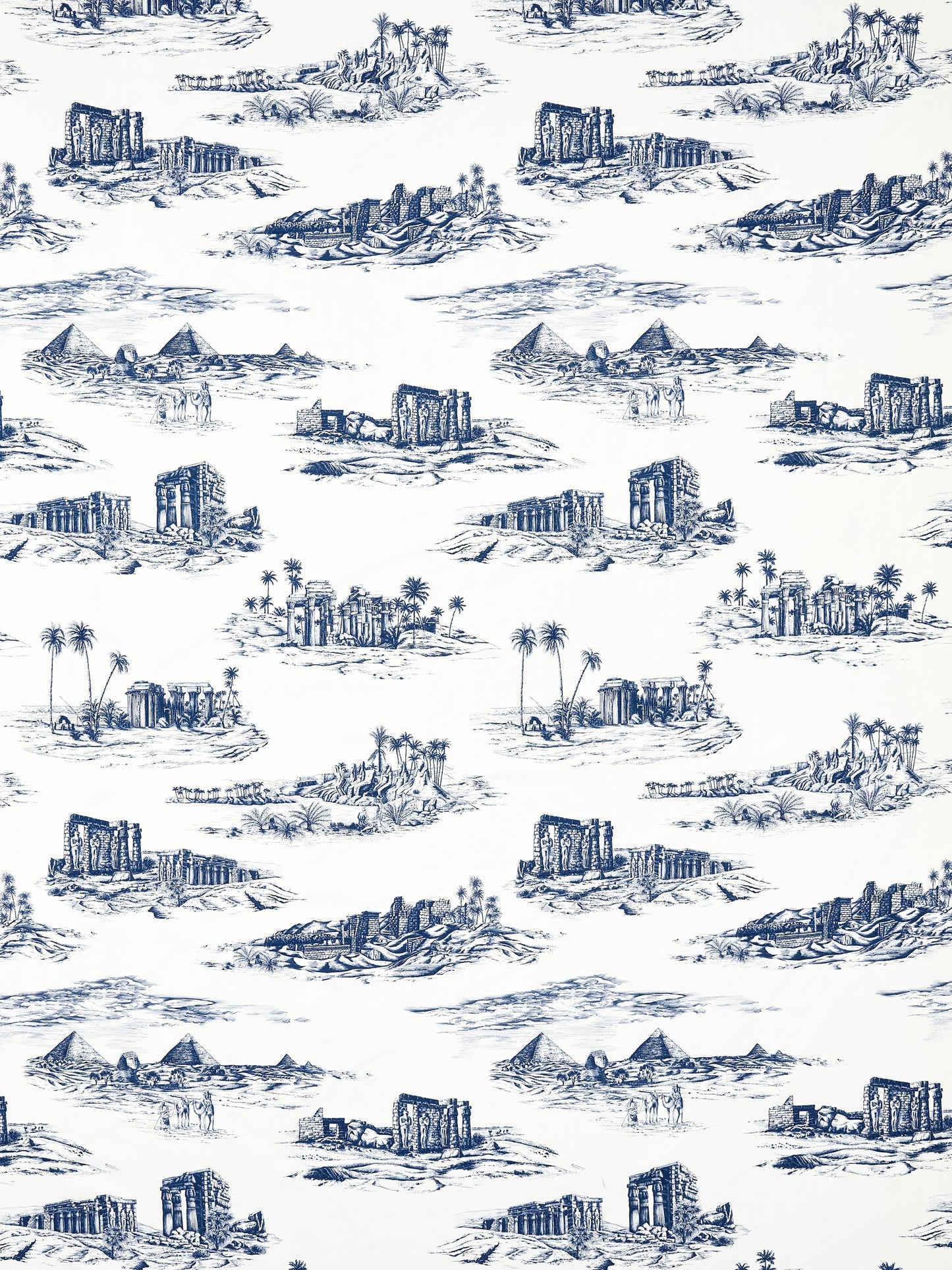 Blue toile-style print of pyramids, temples, ruins, and palm trees on white with repeating island scenes.