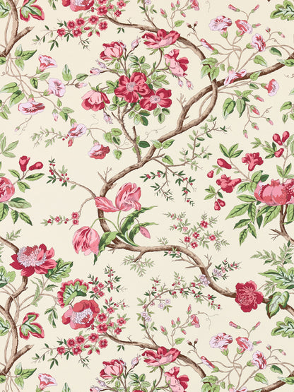 Cream floral wallpaper with pink-red blossoms and green leaves on twisting brown branches.