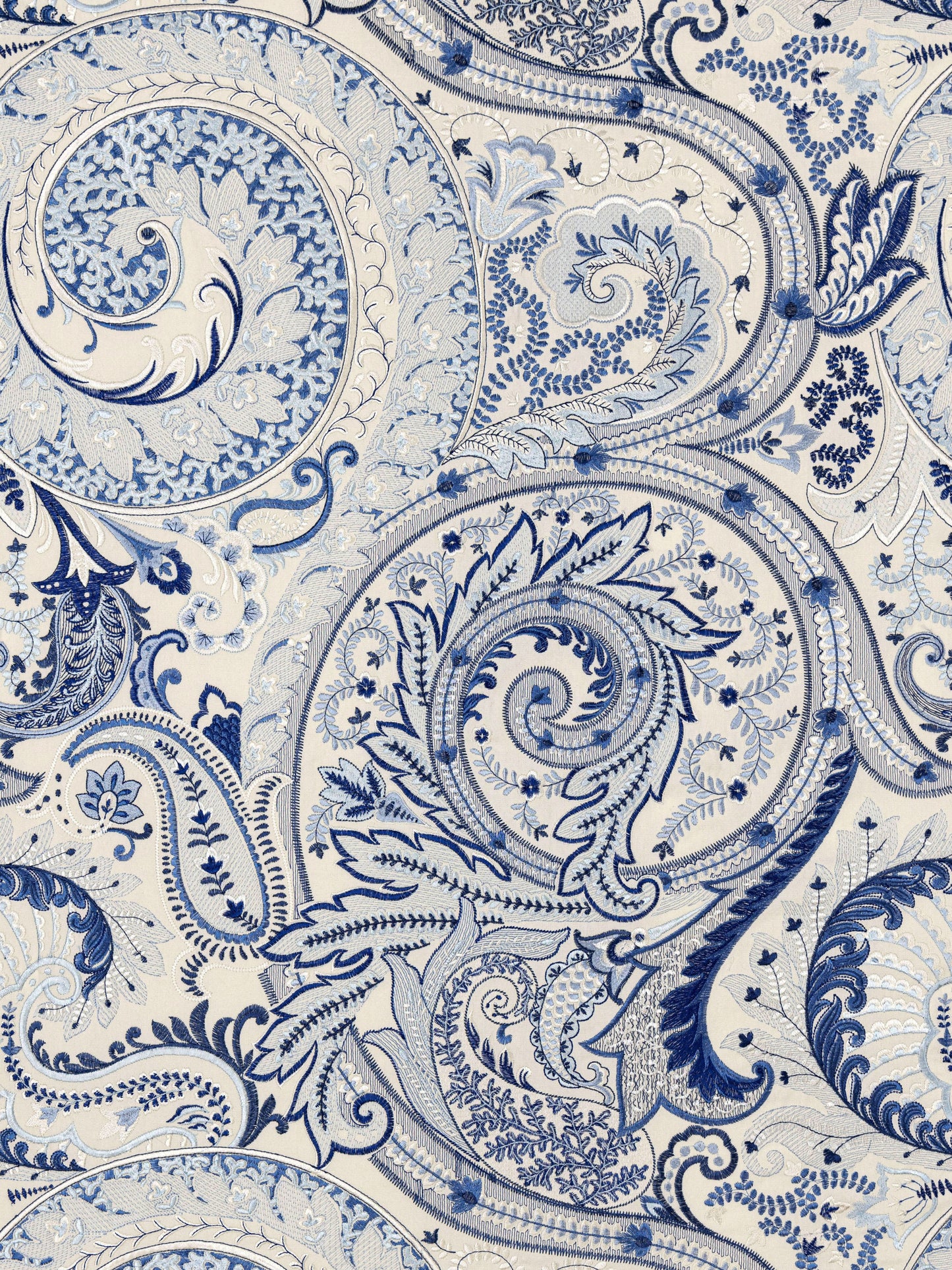 Blue and white paisley floral damask fabric pattern with ornate scrollwork.