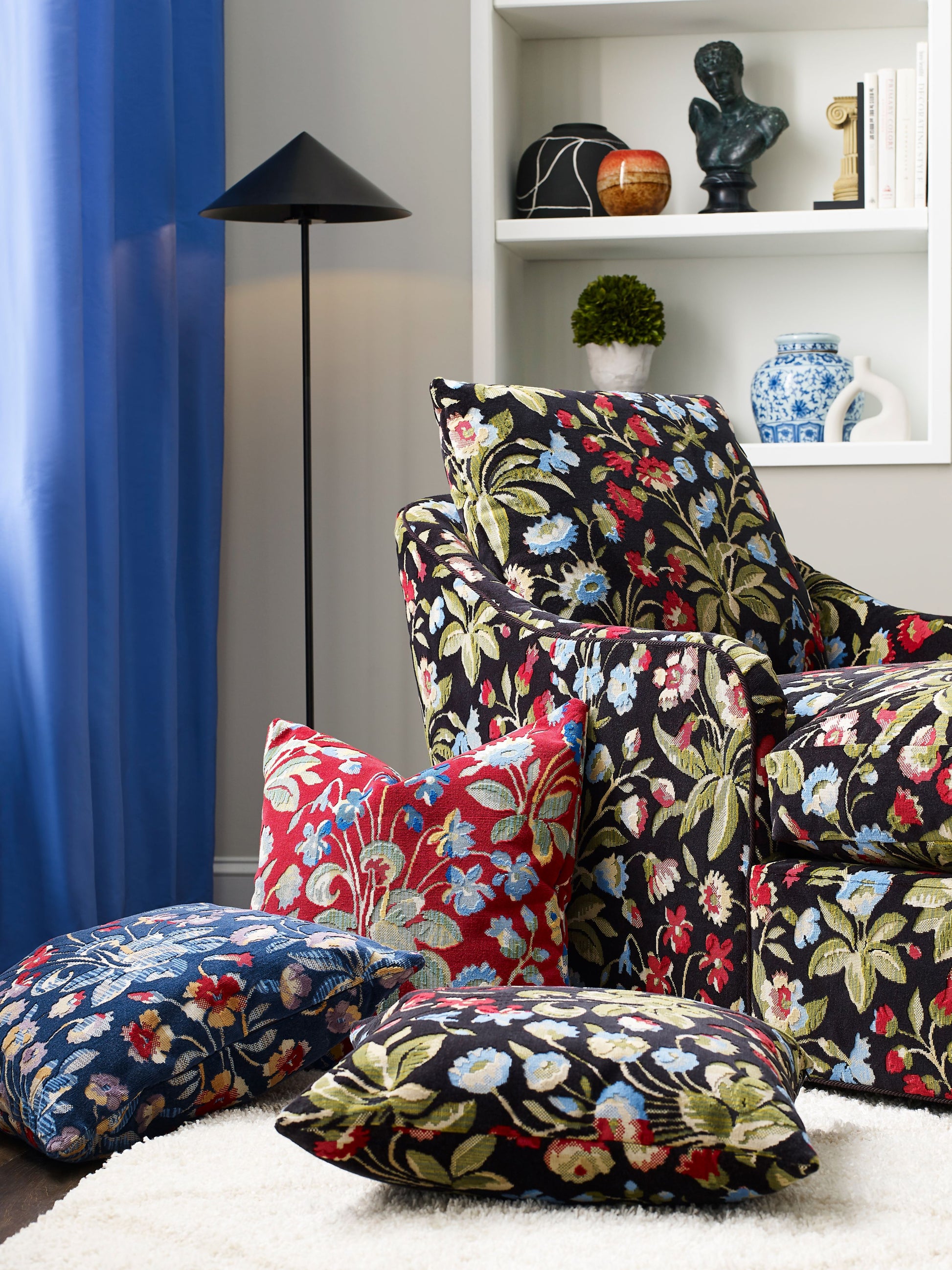 Floral velvet fabric in ruby and cobalt colors.
