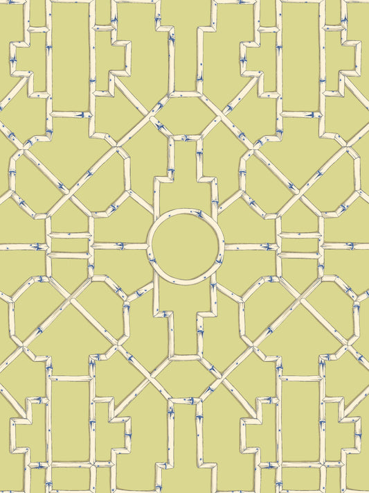 Intricate pale yellow decorative lattice with cream borders and blue specks, featuring a central circular motif.