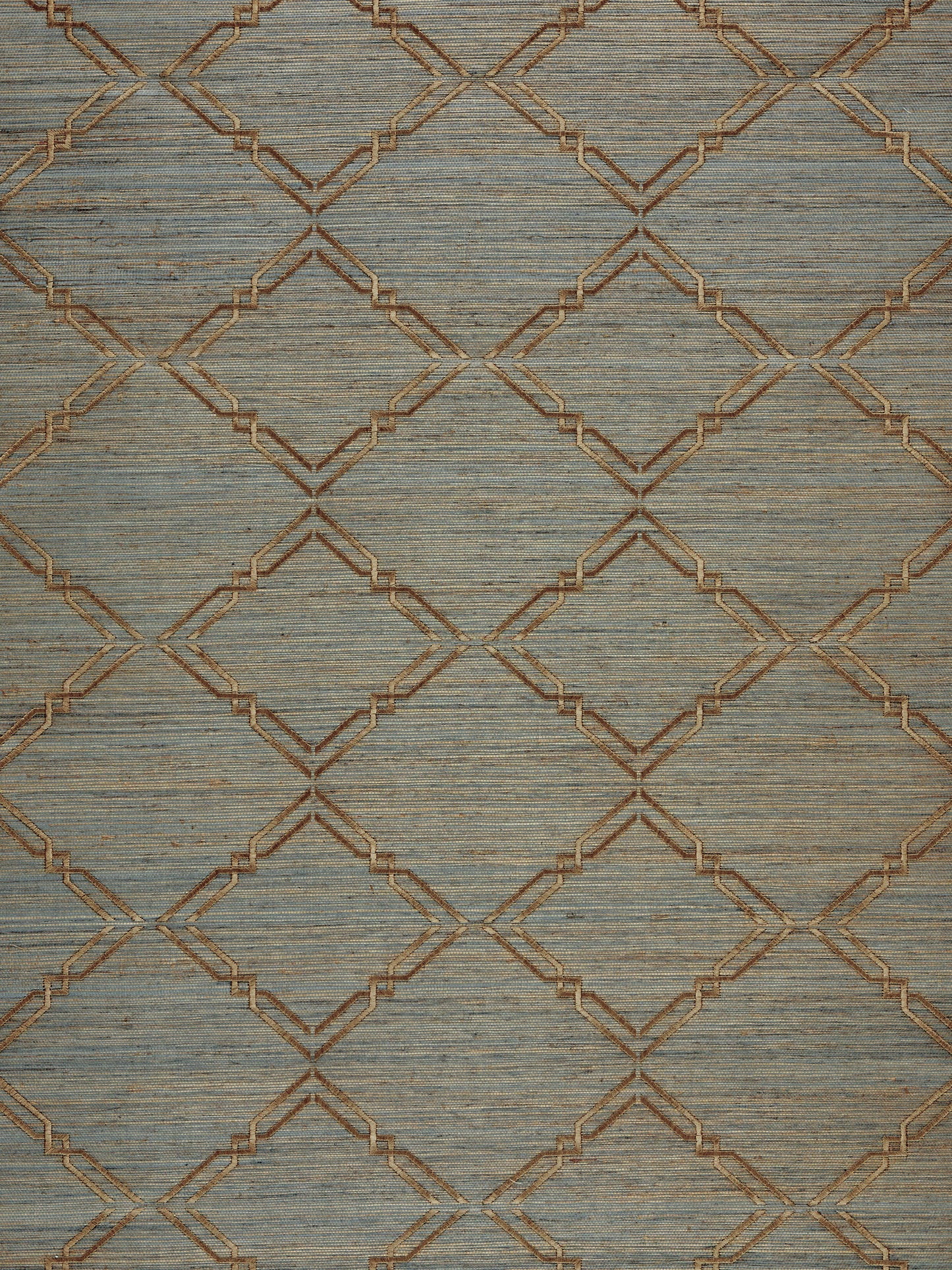 Blue-gray textured rug with a gold diamond lattice trellis pattern.