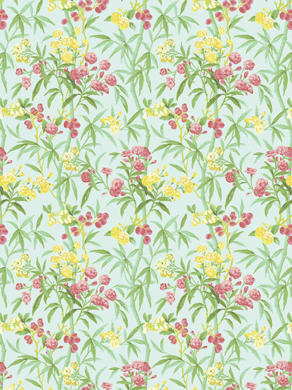 Pastel mint-green fabric with yellow and pink flowers and green leafy vines in a repeating botanical pattern.