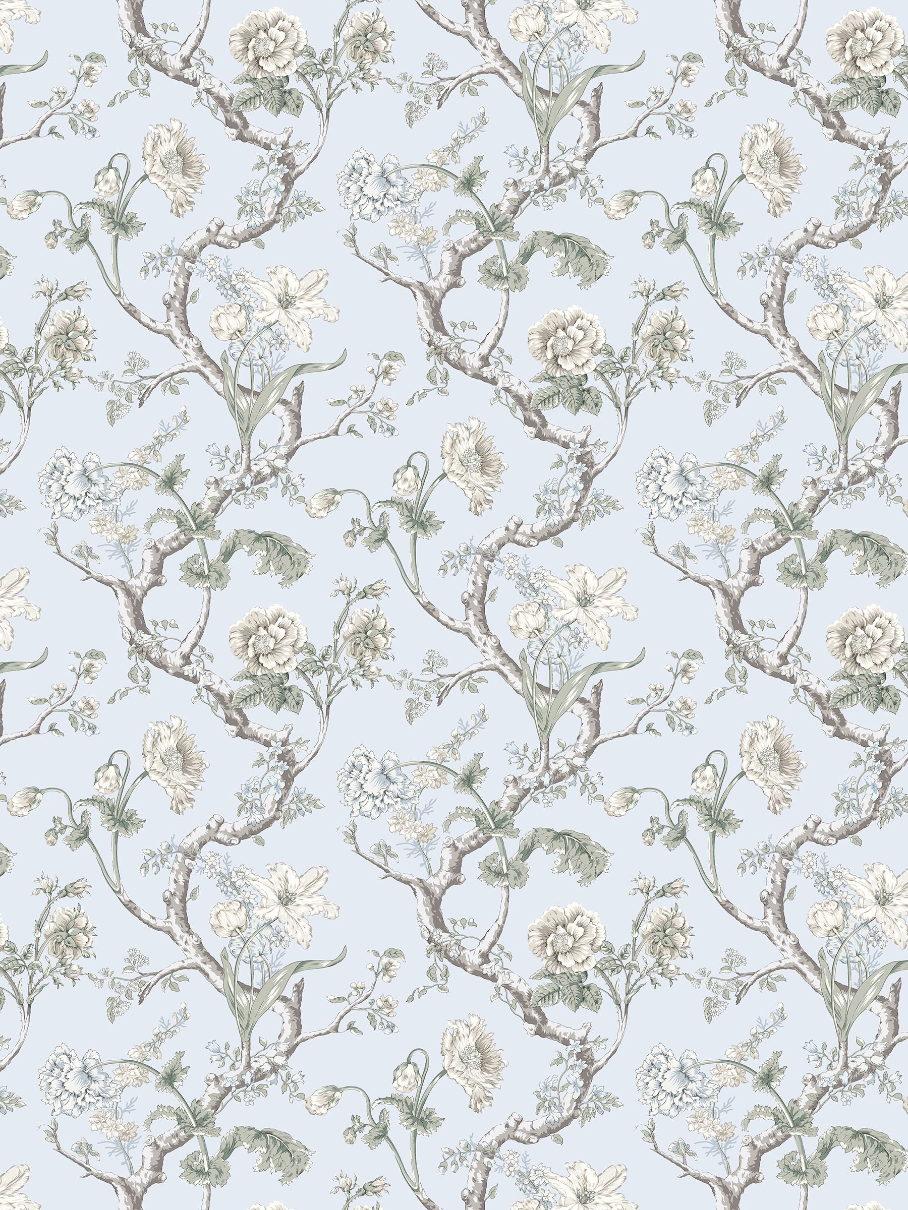 Soft blue-gray wallpaper with winding brown branches, cream roses and green leaves in a vintage botanical pattern.