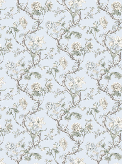 Soft blue-gray wallpaper with winding brown branches, cream roses and green leaves in a vintage botanical pattern.