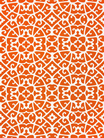 Orange and white Moroccan tile pattern with repeating circular medallions and decorative scrollwork.