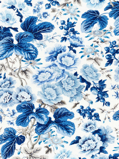 Blue floral linen print fabric with large peony-like blooms and bold leaves on white, versatile for upholstery or curtains.