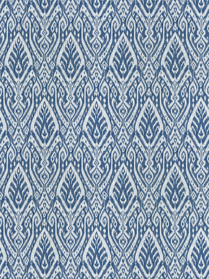 Blue & white ikat-inspired diamond pattern textile with leaf-like motifs; ideal for upholstery or curtains.