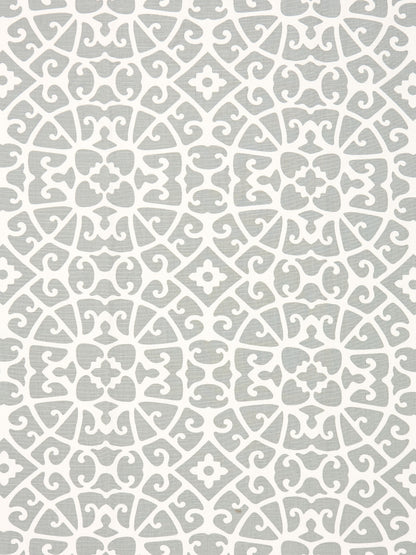 Grey wallpaper with white ornate lattice and floral motifs; repeating circular medallions.