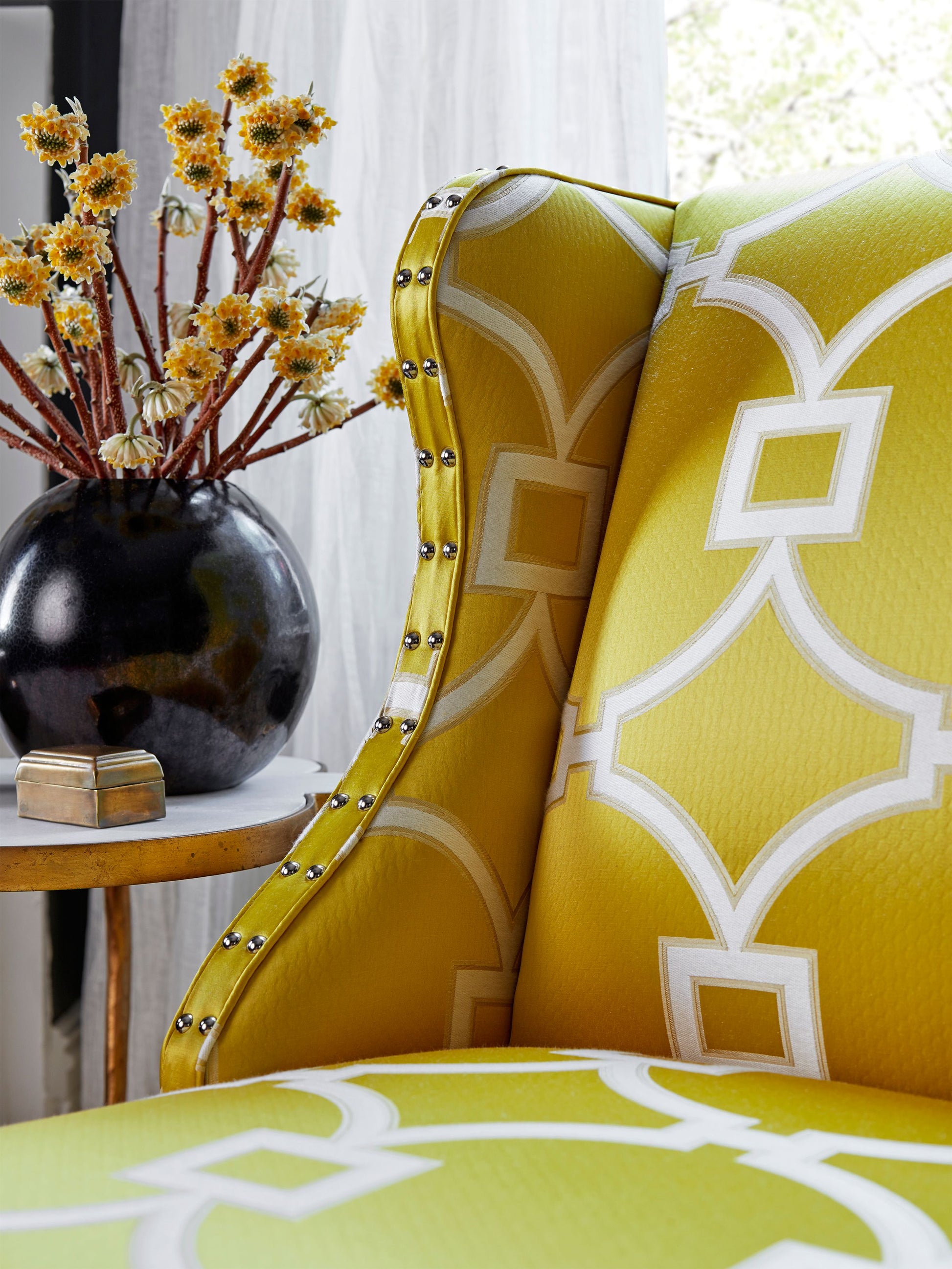 Yellow circle-fret fabric pattern in Forsythia color, fabric swatch.