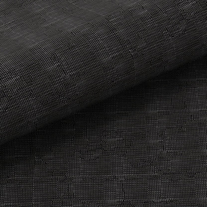 Dark charcoal woven fabric with a tight texture and folded edge, suitable for upholstery or bags.