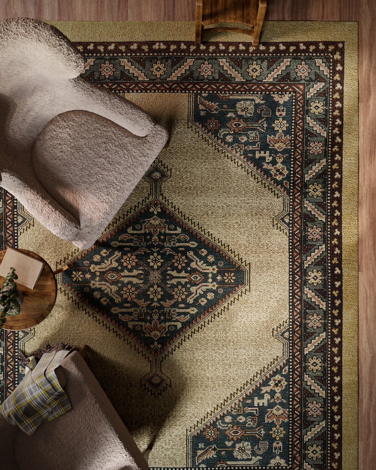 Beige oriental rug with navy geometric medallions; 8' x 10' rug and a round wood side table with a plant.
