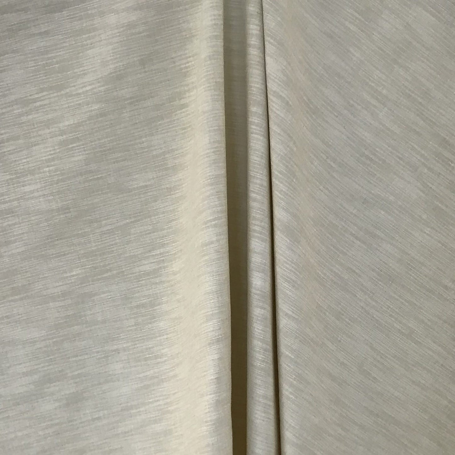 Beige shantung fabric with subtle textured weave.