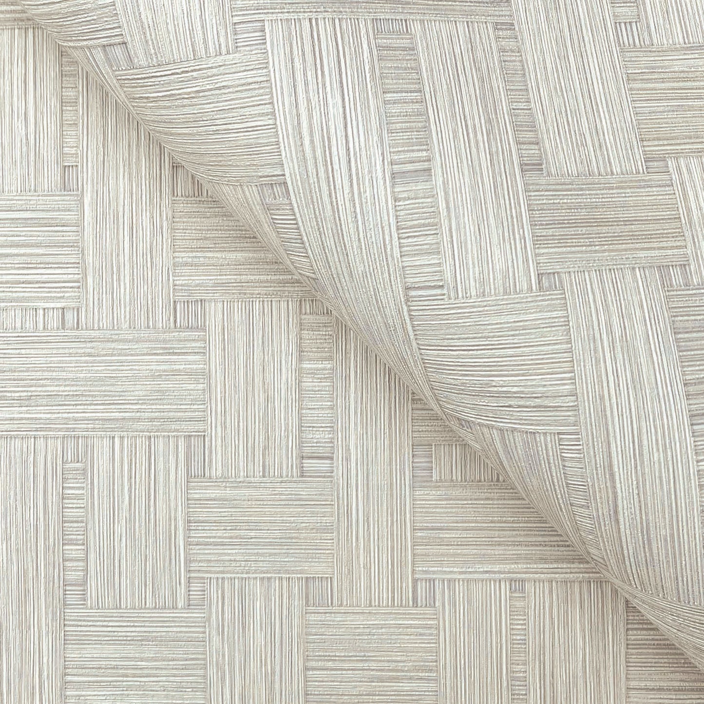 Cream-beige textured vinyl wallpaper with parquet-like woven stripe squares and a curled edge.