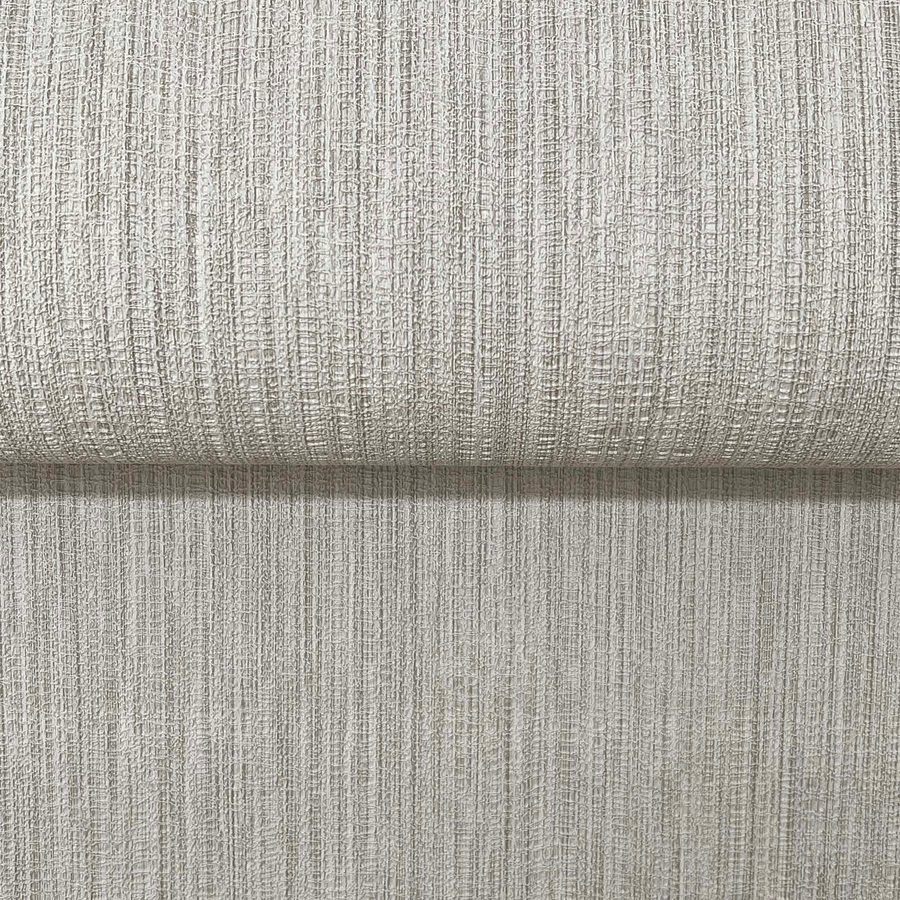 Cream-beige textured woven fabric with vertical ribbed weave, upholstery-style surface.