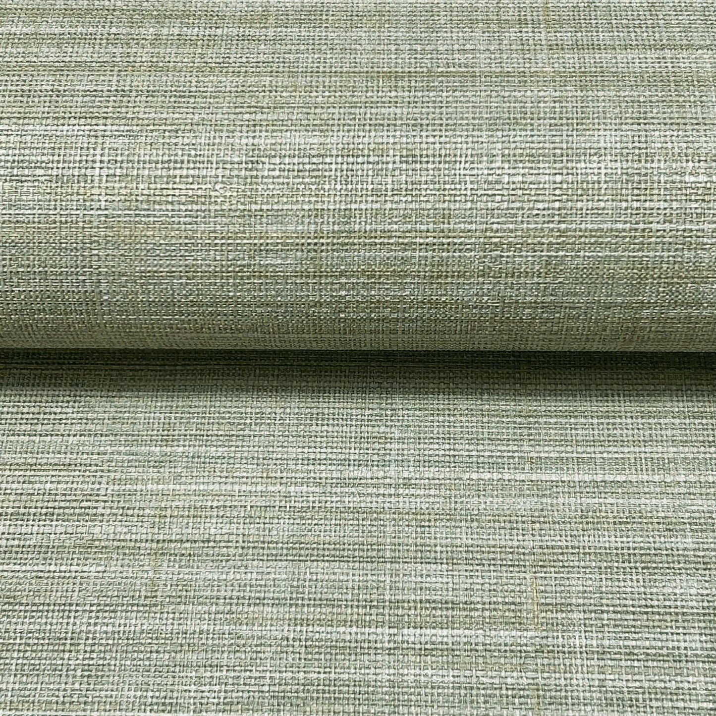 Sage-green woven linen fabric with a chunky crosshatch texture, rolled edge, natural rustic upholstery look.
