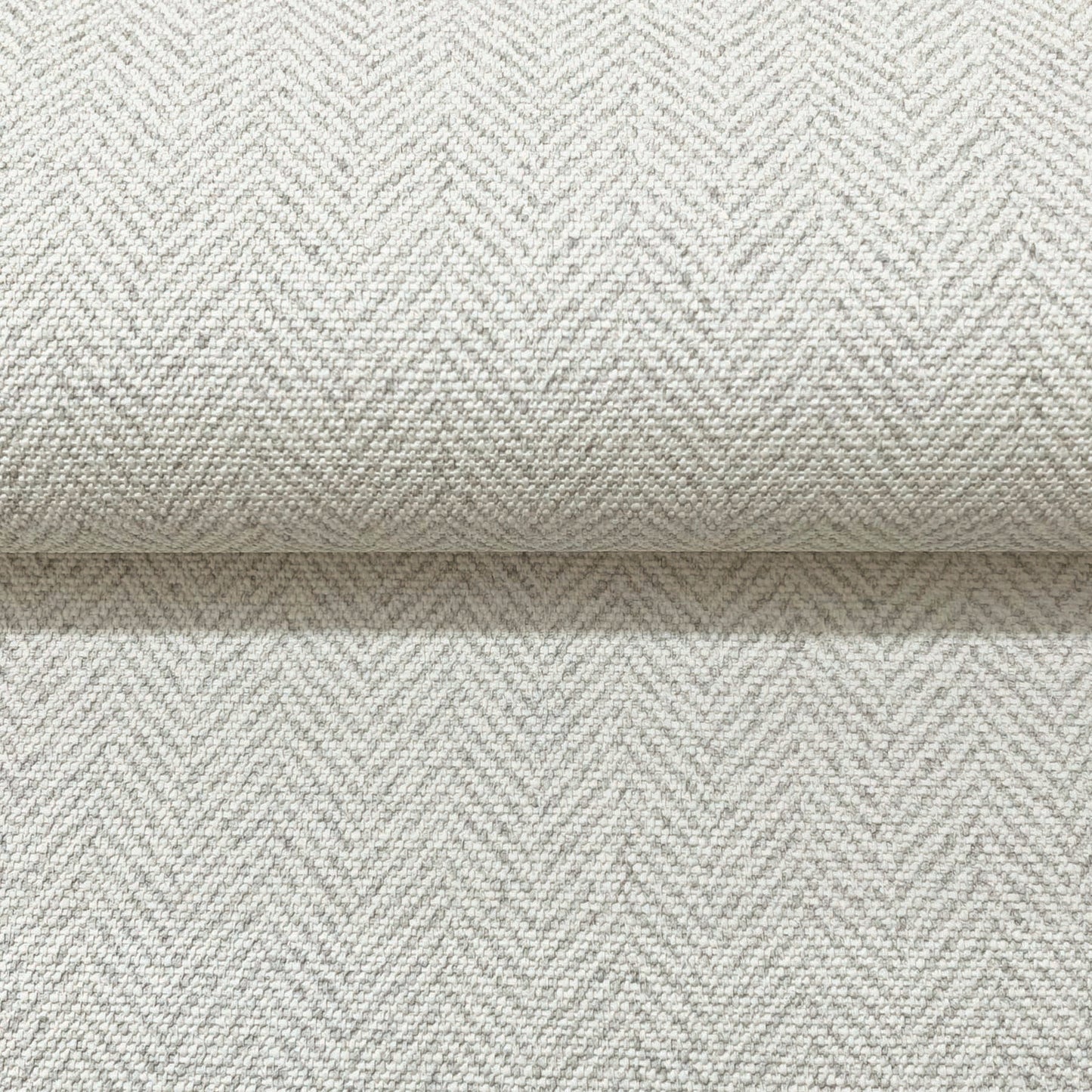 White chevron wallpaper with a subtle woven texture and rolled edge.