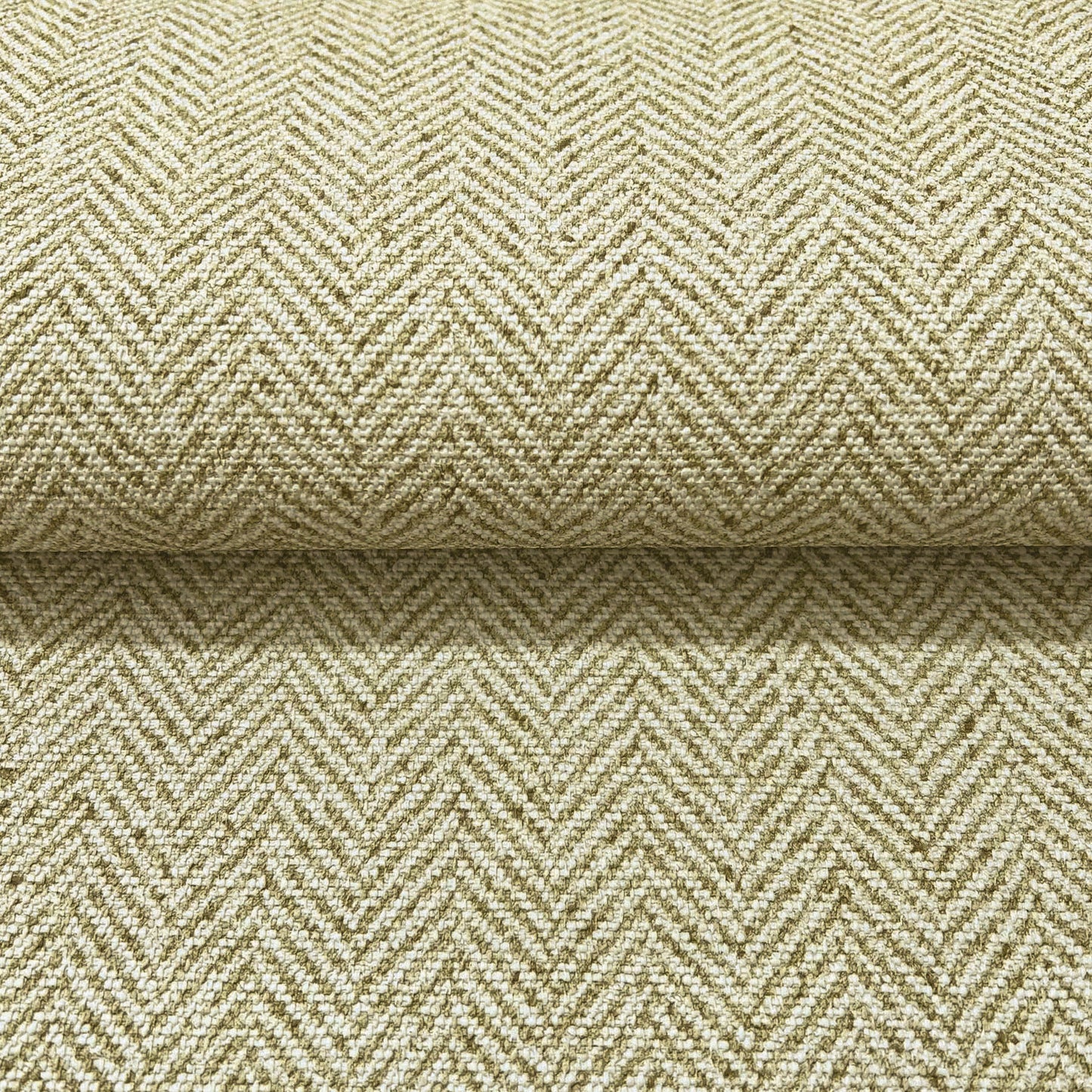 Green chevron herringbone wallpaper with a textured weave; masculine green tones on a wallpaper roll for walls.