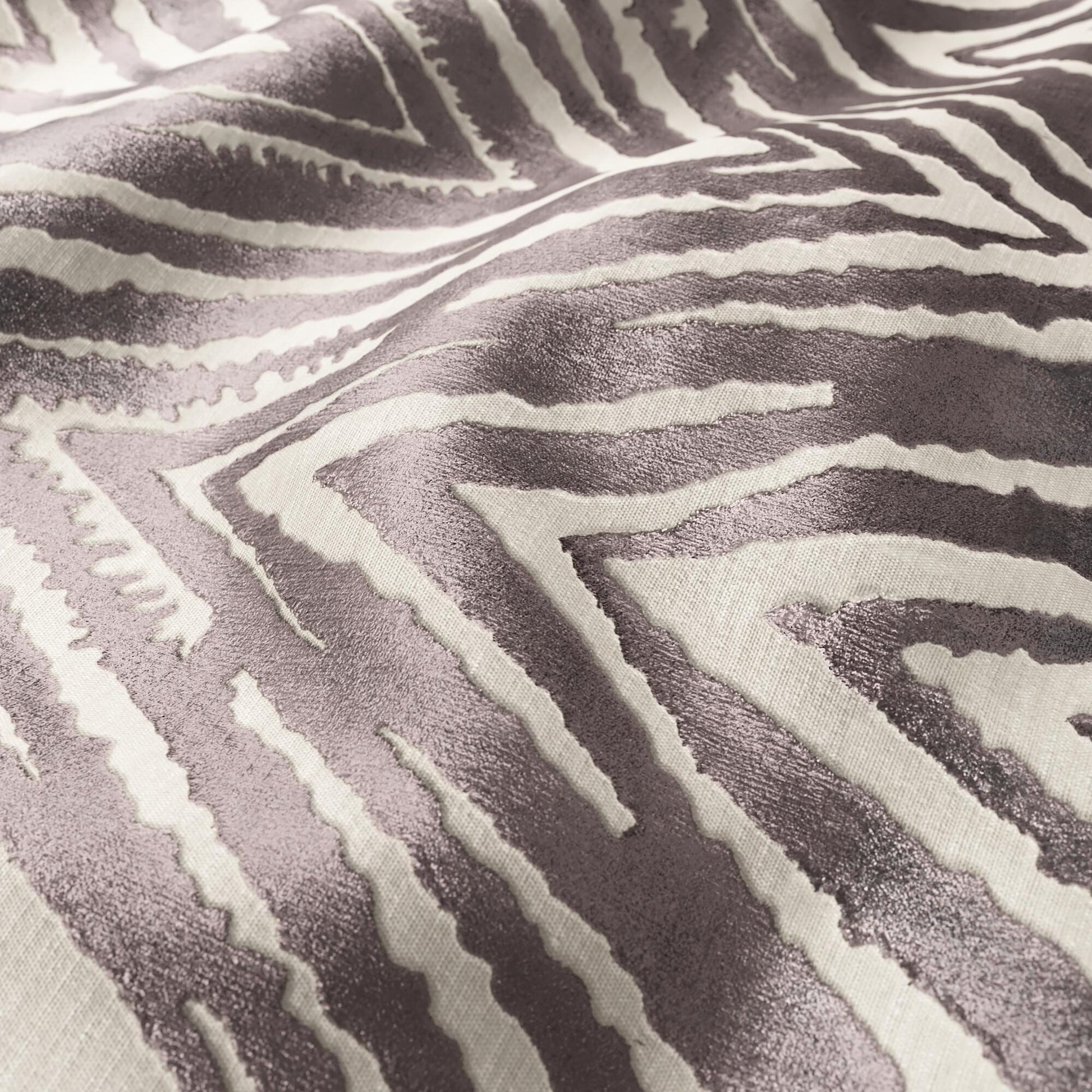 Mauve & taupe zebra-stripe velvet fabric with a soft velvety texture, suitable for throws or rugs.