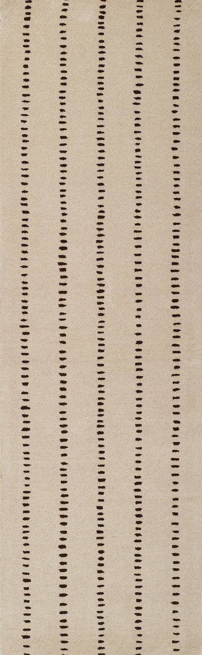 Beige textured rectangular rug with vertical rows of dark brown dots; modern minimalist stripe design.