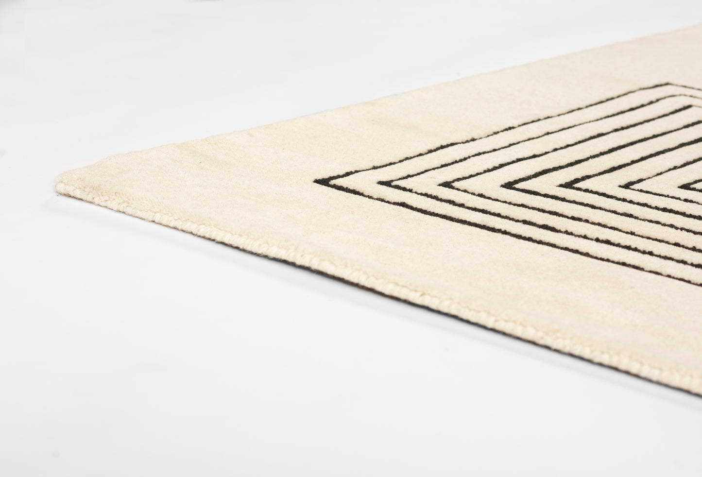 Cream plush runner rug with black nested square geometric lines; modern minimalist floor decor; 2'6" x 8'.