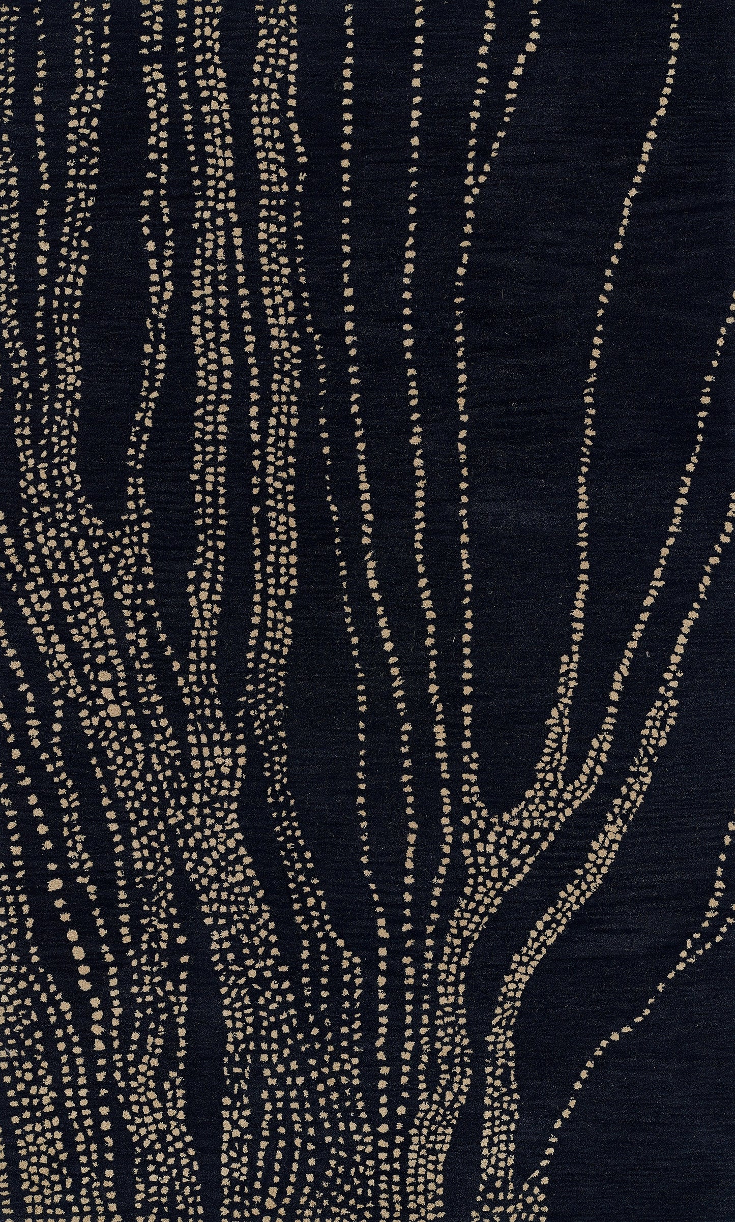 Navy area rug with beige dotted tree-branch pattern; abstract botanical motif.