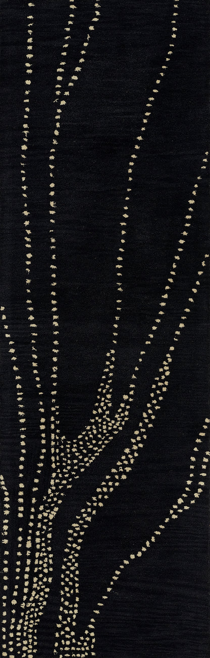 Black rug with a gold beaded branch pattern; dotted lines form a tree-like embroidery design.