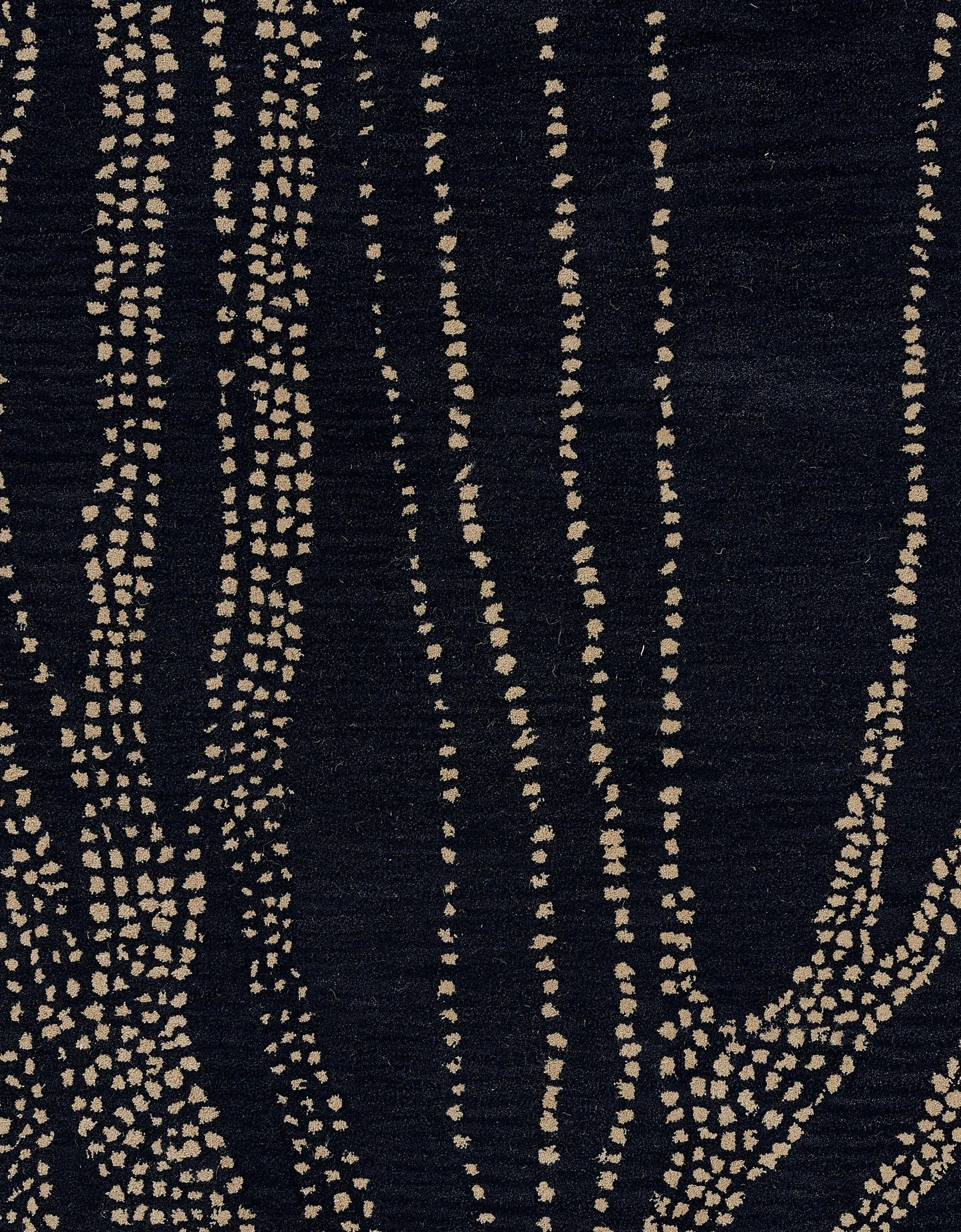 Navy woven runner rug with beige dotted vertical stripe pattern; abstract modern floor textile.