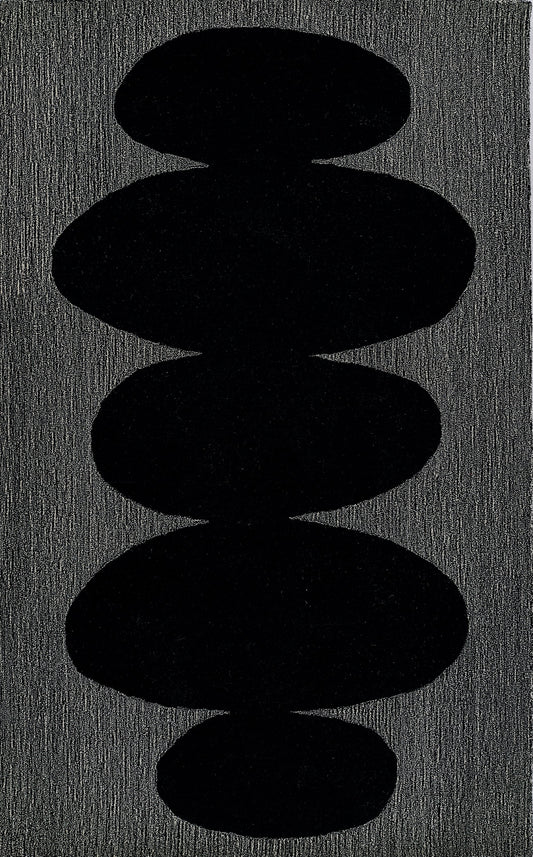 Vertical stack of five smooth black pebble shapes on a charcoal textured surface.