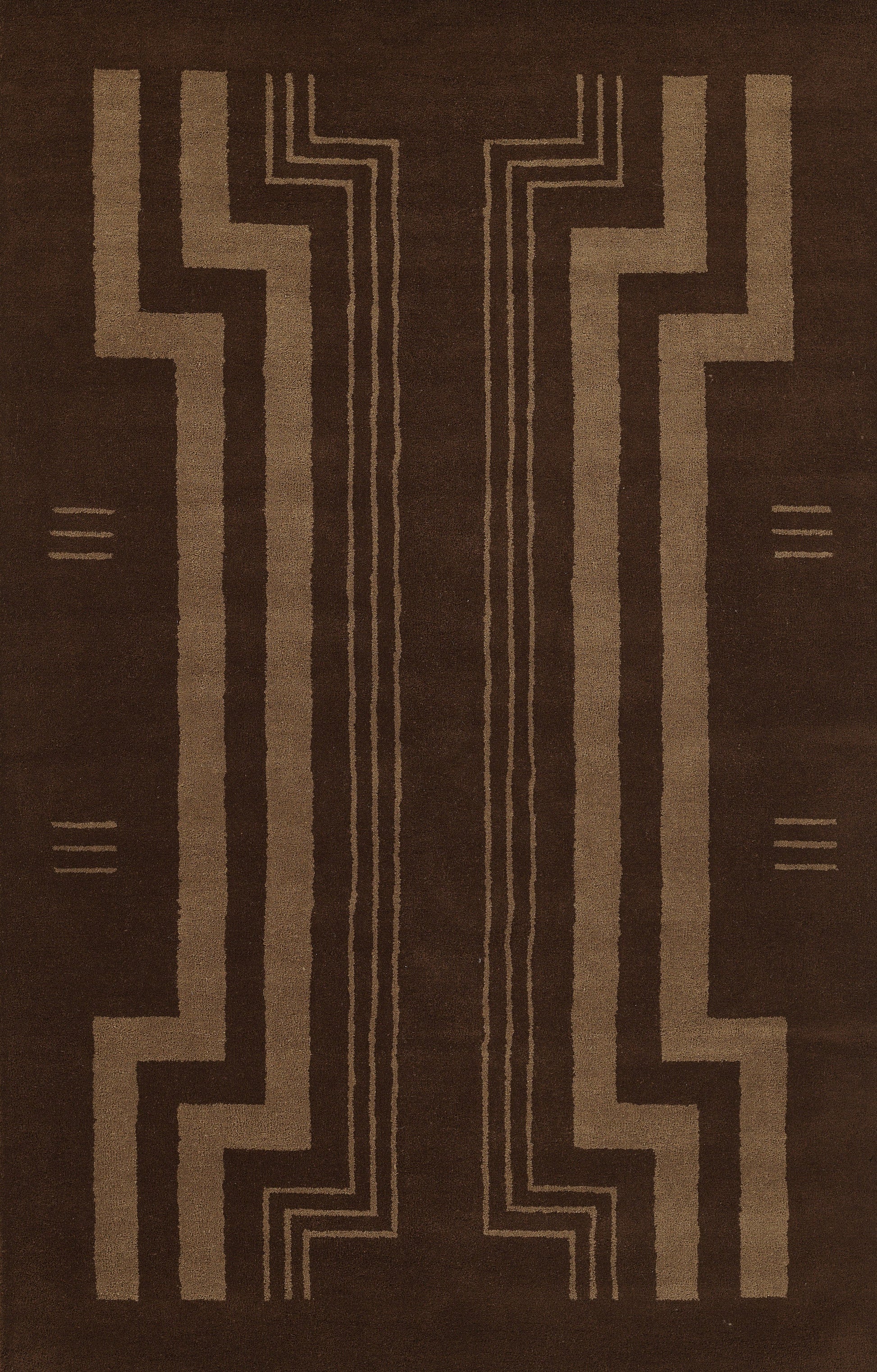 Brown rug with tan geometric stepped patterns and central mirrored zigzag lines, tribal Art Deco style.