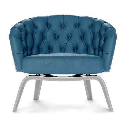 Blue solid fabric barrel chair.