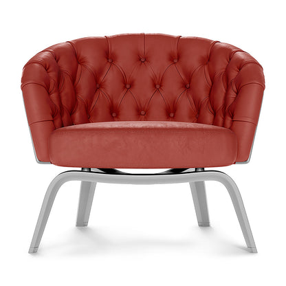Red tufted fabric lounge chair with round seat and curved sled-style metal legs.