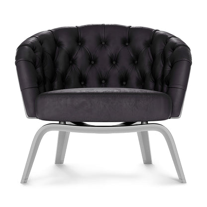 Purple solid fabric chair with curved arms.