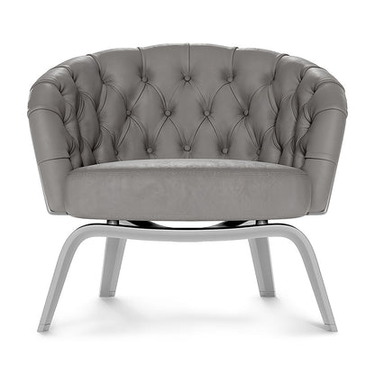 Grey fabric tufted barrel lounge chair with curved arms and metal curved legs.