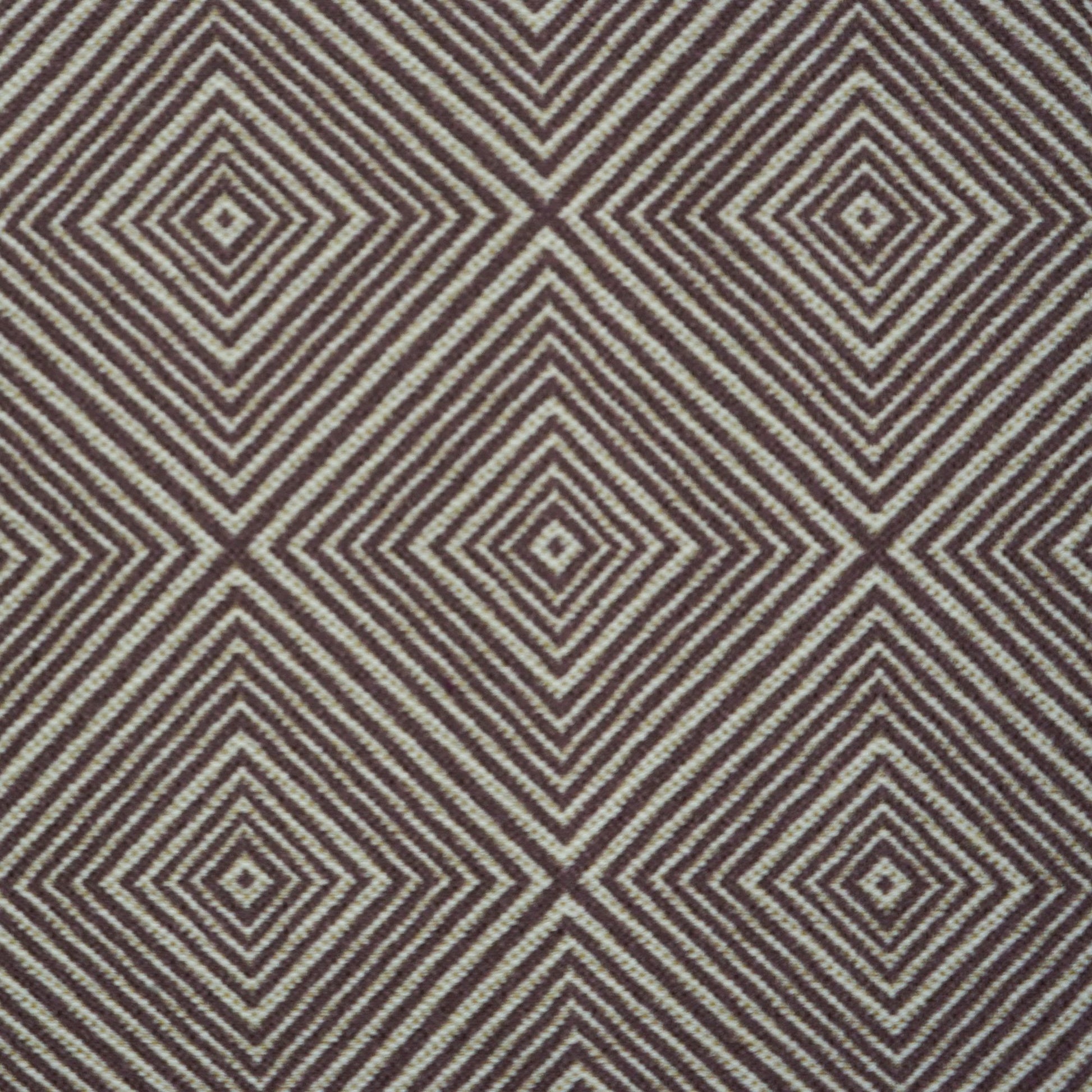 Brown and ivory geometric fabric with concentric diamond shapes.