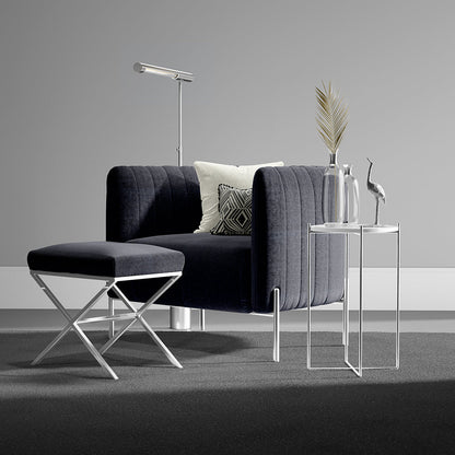 Midnight solid upholstery fabric swatch in charcoal, shown in a lifestyle image with a modern living room and decor.