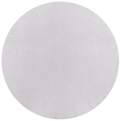 Gray shag rug with a soft, plush pile.