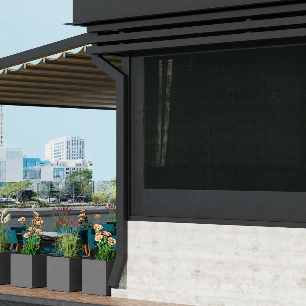 Black mesh fabric panel mounted on a gray frame beside a modern pergola with planters.