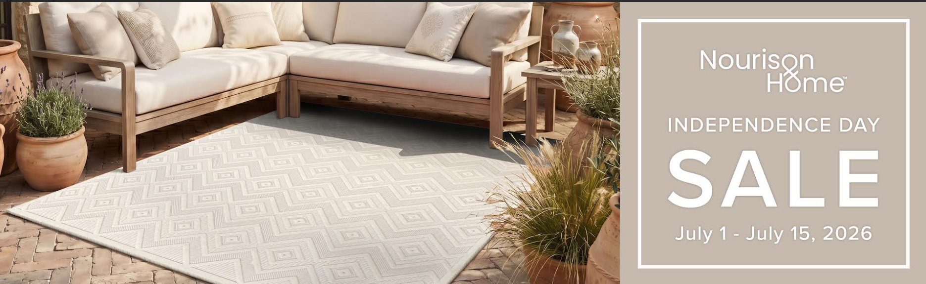 Outdoor furniture set with a rug on a patio, featuring Nourison Home branding.