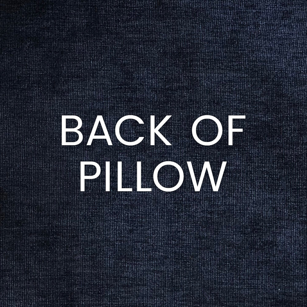 Dark navy denim-style fabric with white BACK OF PILLOW lettering across the surface
