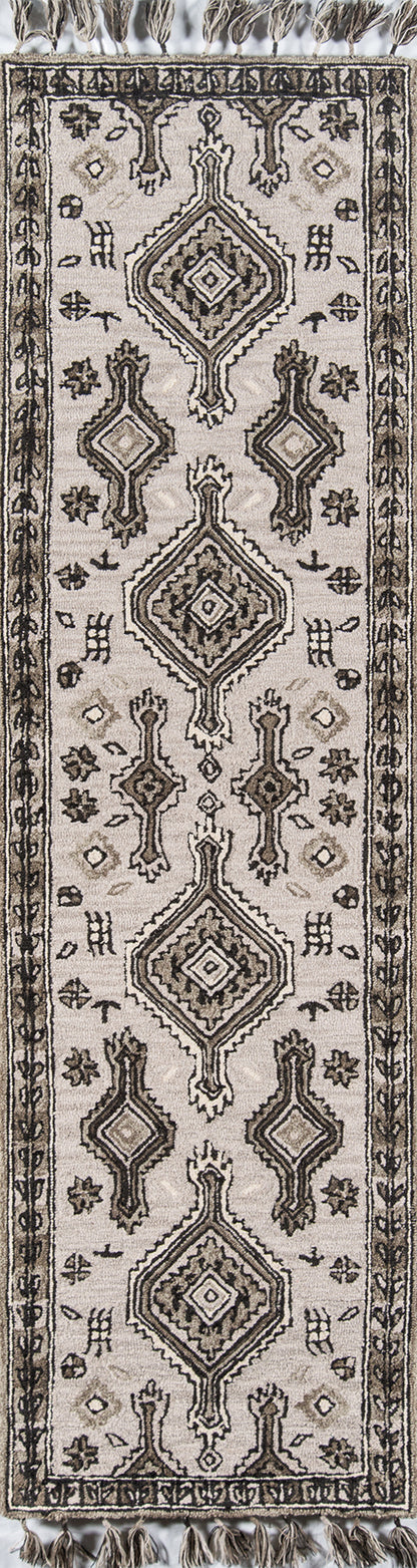 Grey-beige oriental rug with dark brown geometric medallions and fringe tassels.