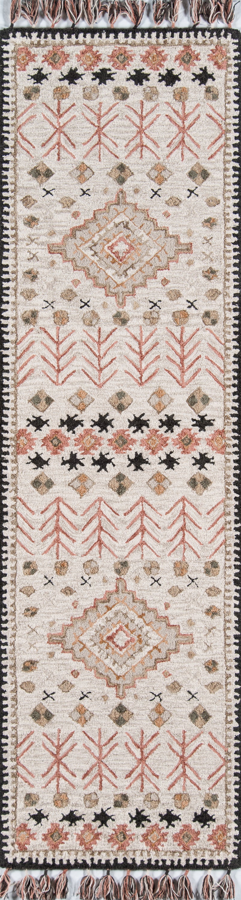 Southwestern runner rug with ivory field, large diamond medallions, pink-peach chevrons, tan accents, and black border motifs.
